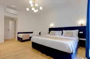 Camera del Boutique Hotel SM Vatican Relais con letto matrimoniale e letto singolo