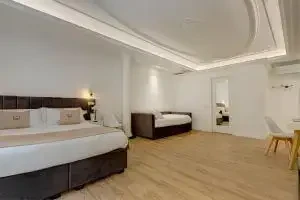 Camera doppia del Boutique Hotel SM Vatican Relais con due letti e arredo moderno